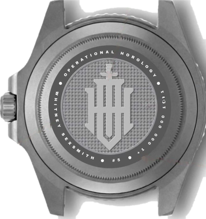 Engraved caseback showing the mark, member name, issue number, and operations line